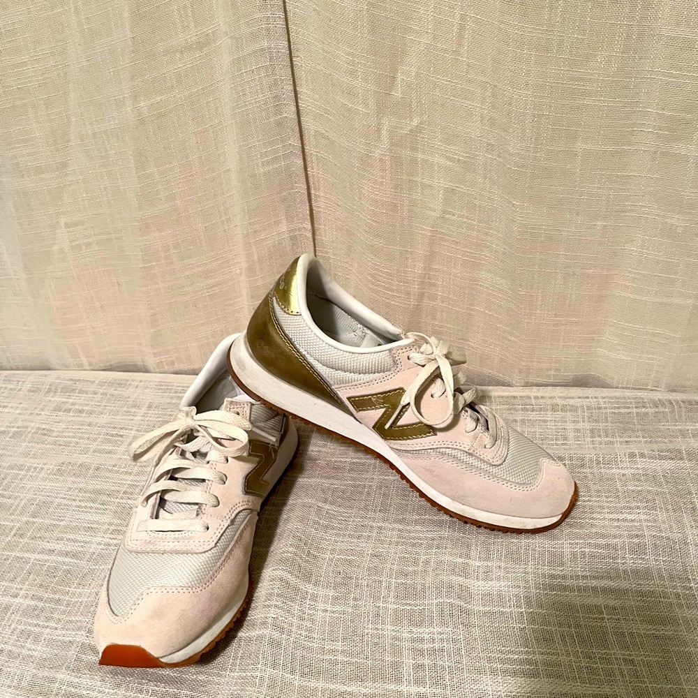 New Balance Women's White and Gold Metallic Sneakers
